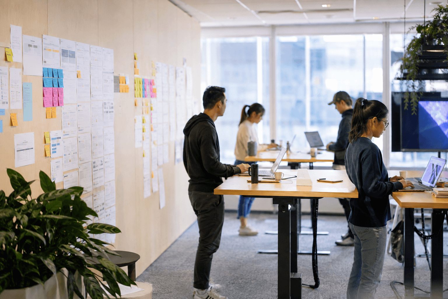 Team coordinating software delivery in an open office